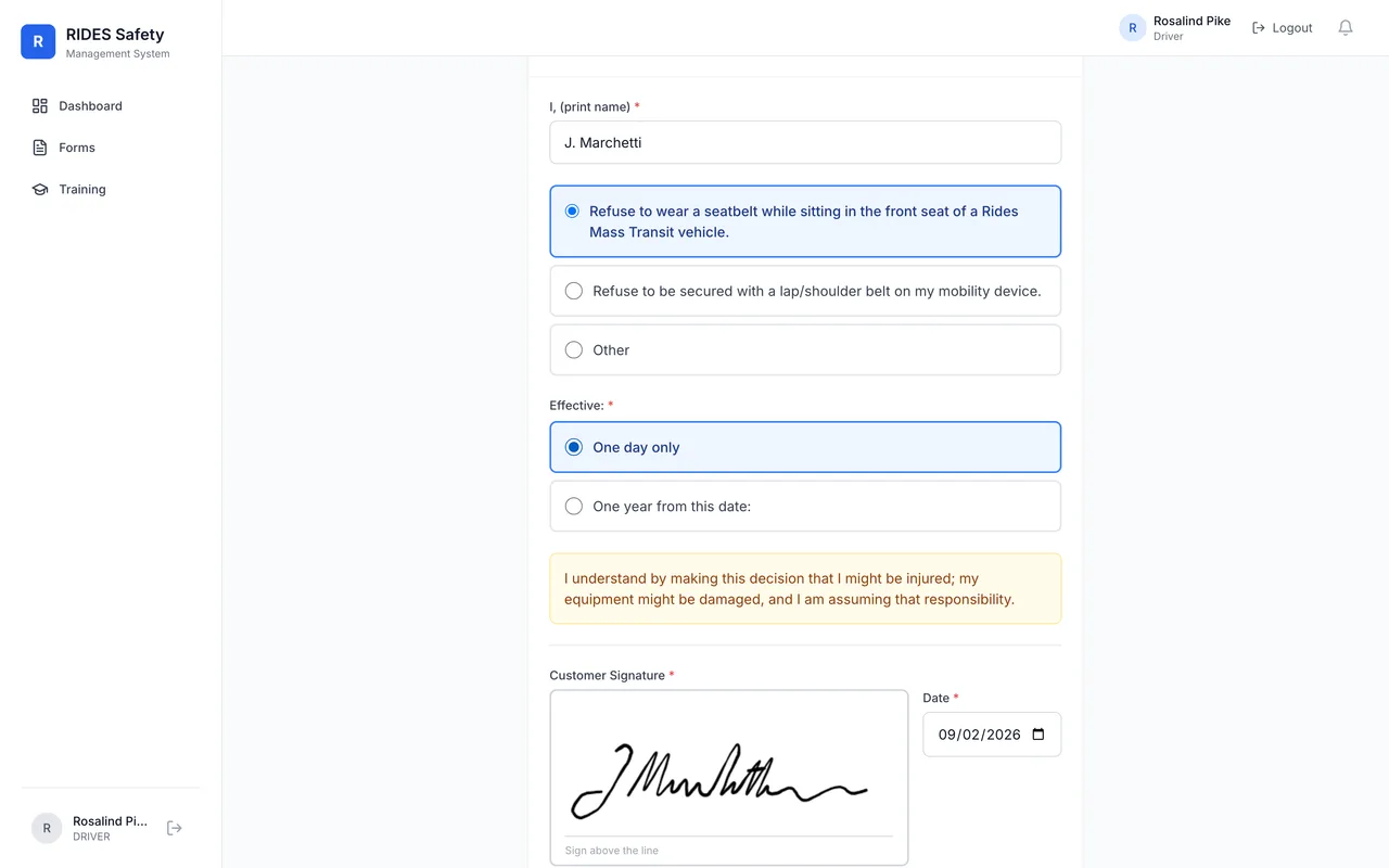 The seatbelt waiver on a driver&rsquo;s tablet: the passenger&rsquo;s printed name, the selected line reading &lsquo;Refuse to wear a seatbelt while sitting in the front seat of a Rides Mass Transit vehicle,&rsquo; an acknowledgment of responsibility, and a hand-drawn customer signature dated today.